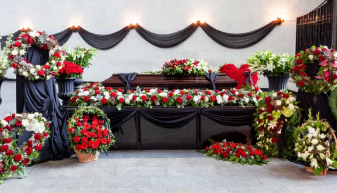 kista och blommor, begravning